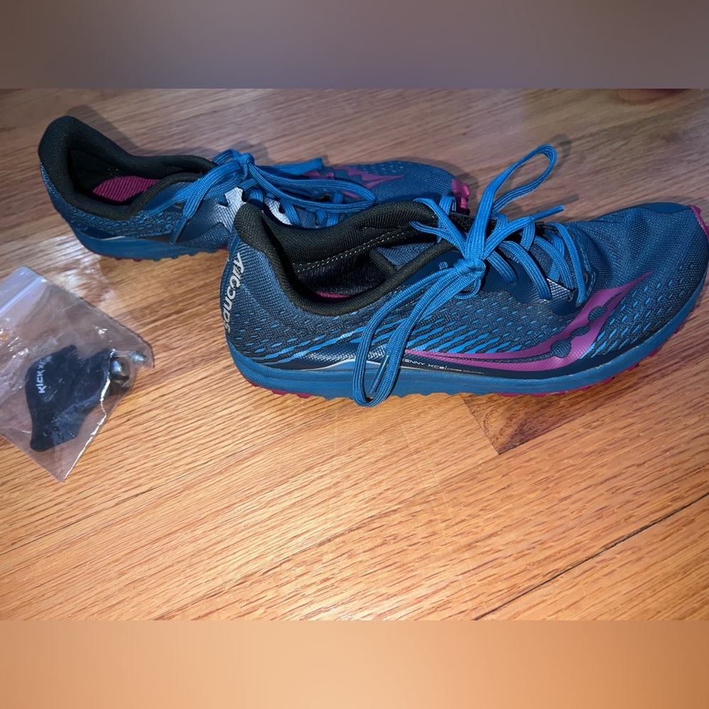 Lightly worn saucony cross country spikes! <20 miles on them